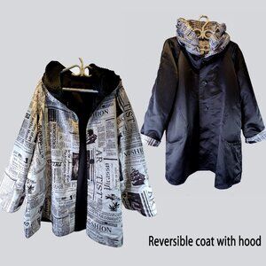 Reversible Newspaper print/ Black jacket with pleated hood Size XXL